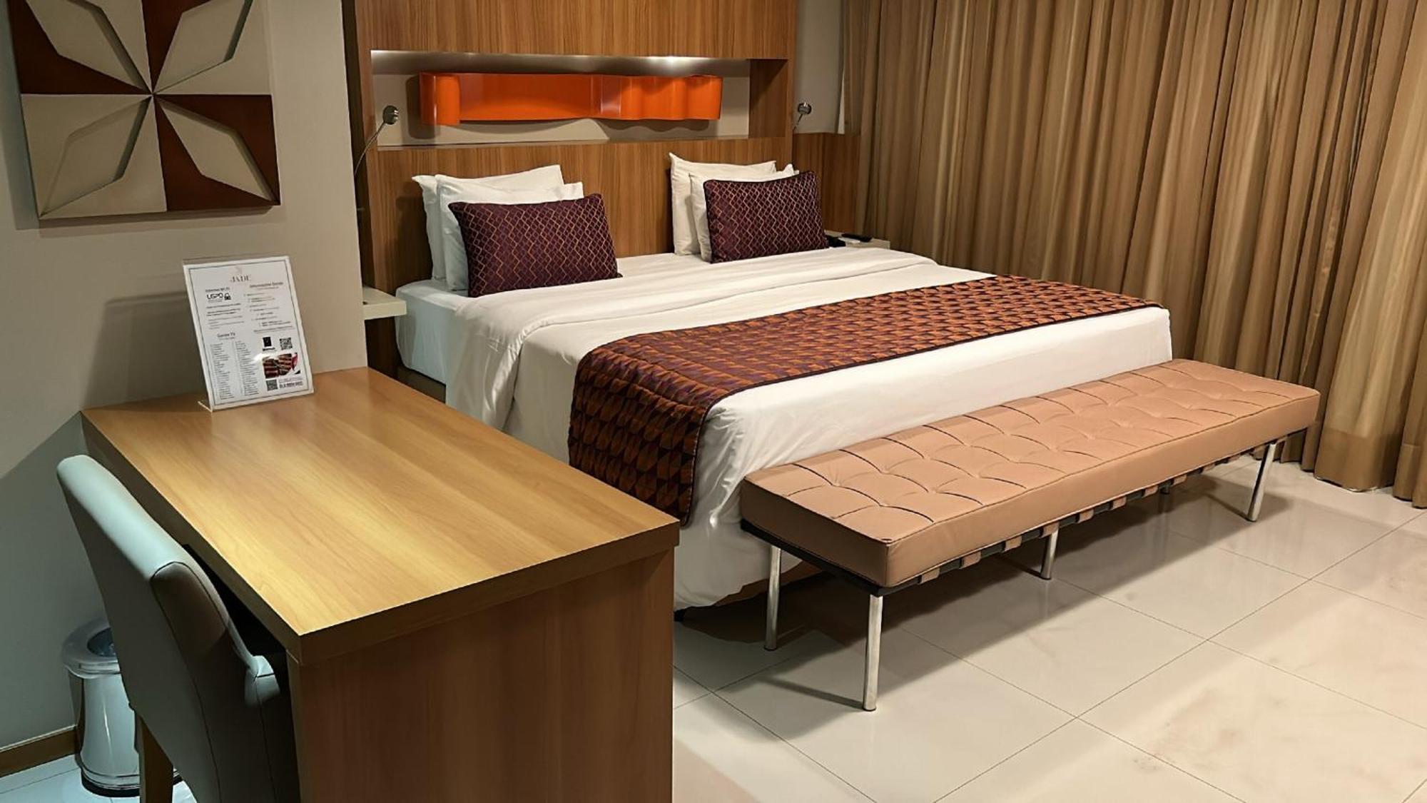 Jade Hotel Brasilia Candangolandia Exteriör bild A bedroom at the hotel